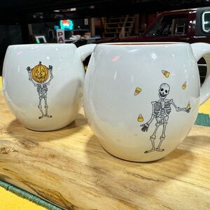Rae Dunn Artisan Collection Dancing Skeletons Mugs Halloween Set of 2 NWOT